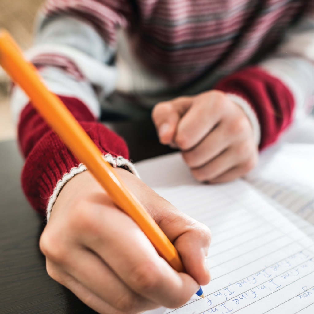 Young student writing